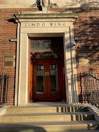 This is the door that Princess Diana and Princess Kate came out holding up their babies to show the world.  An heir and a spare!  It's right on the road called the Wharf Road and it's very non-descript, not Royal at all