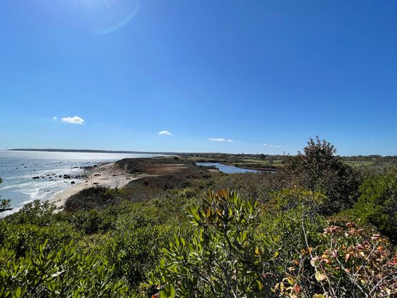 Pond, ocean and sky.