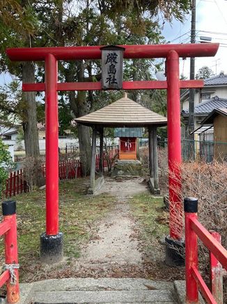 Mini shrine along the street