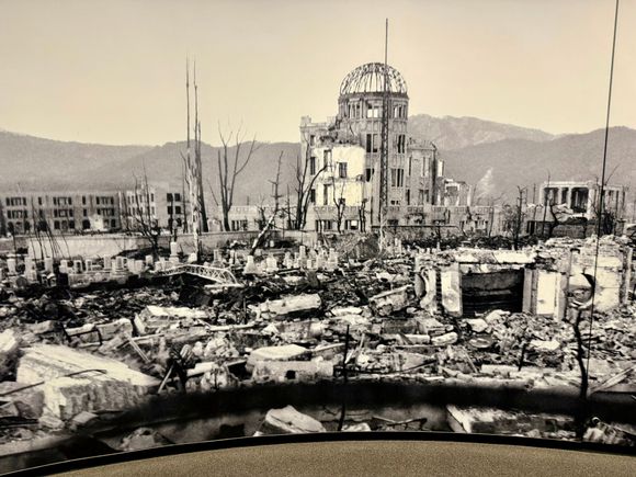 The aftermath with the Prefectural building still standing but obviously destroyed.