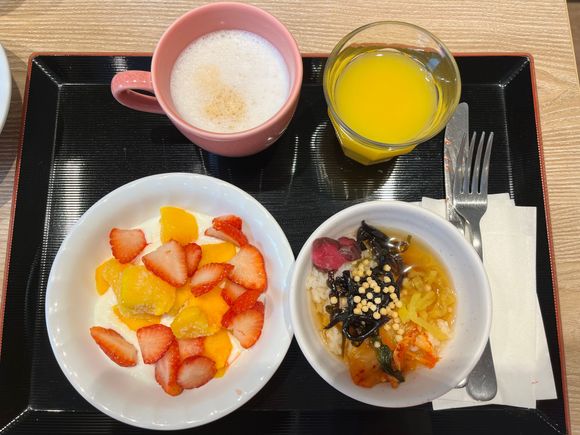 Final breakfast at Hotel Vista- East meets West! Bowl of ochazuke (dashi over rice) and Bowl of yogurt toooed with fruit 