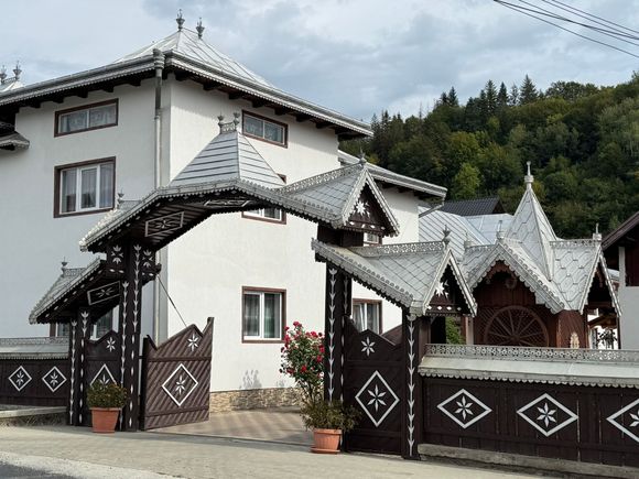 The ubiquitous wooden fences and gates found throughout Romania. The fancier gates signify wealth. 
