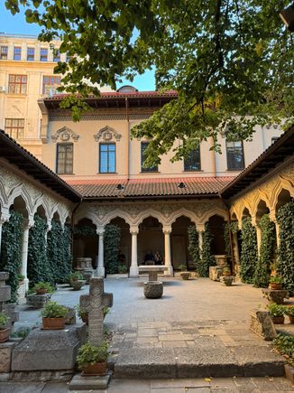 Stone cloister with columns and arhces