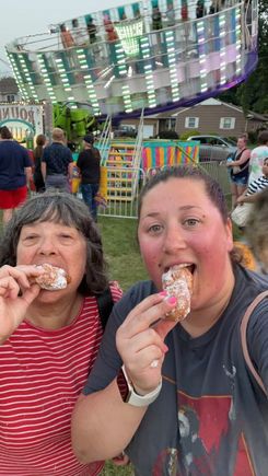 Eating zeppolis is the best part of a carnival 