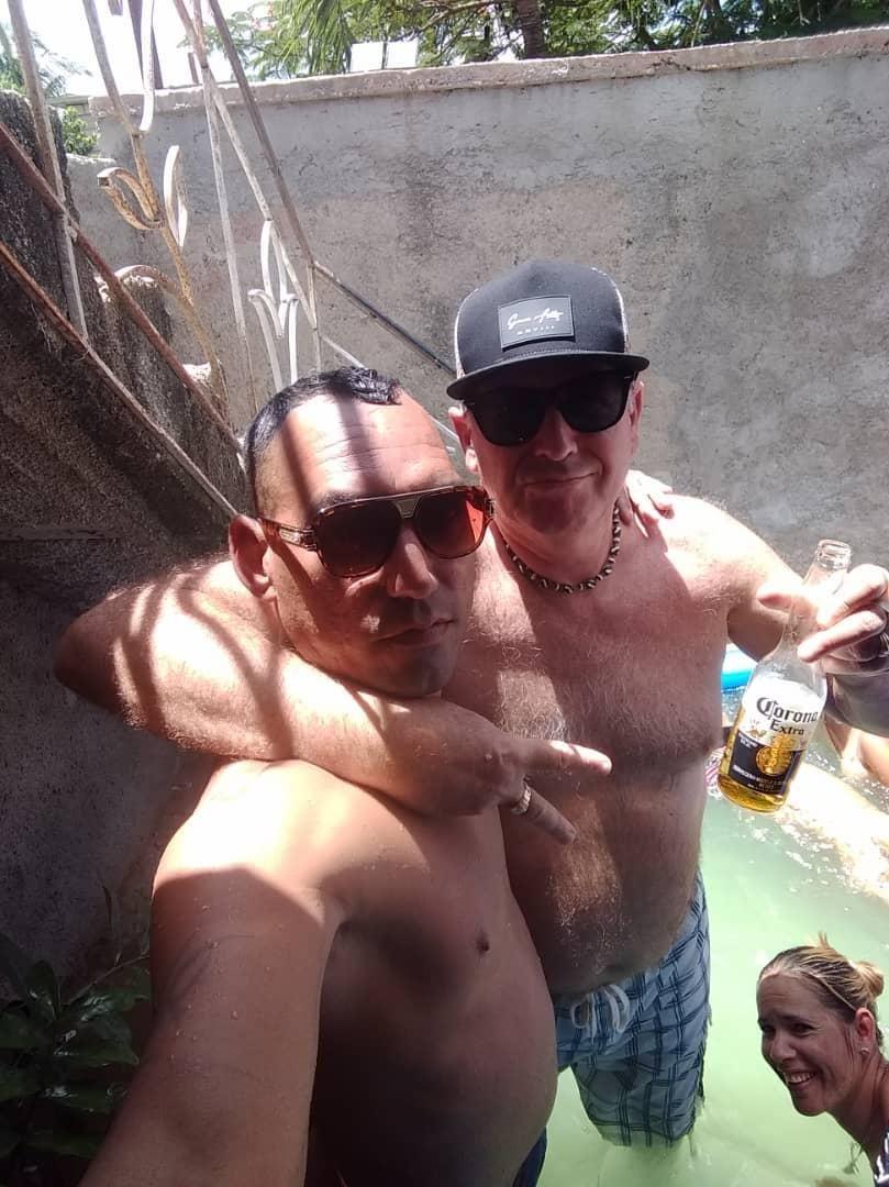 Maikel, me, and Yudith down below, having fun in our casa's swimming pool together to help stay cool. Of course more ice cold beer and Cuba Libres were involved - when are they ever not?? 