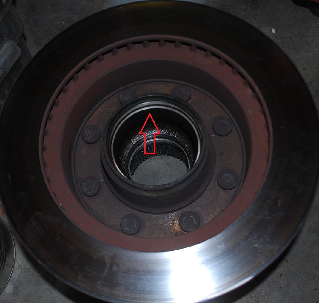 Best way to remove wheel bearing race stuck to spindle? Ford Truck