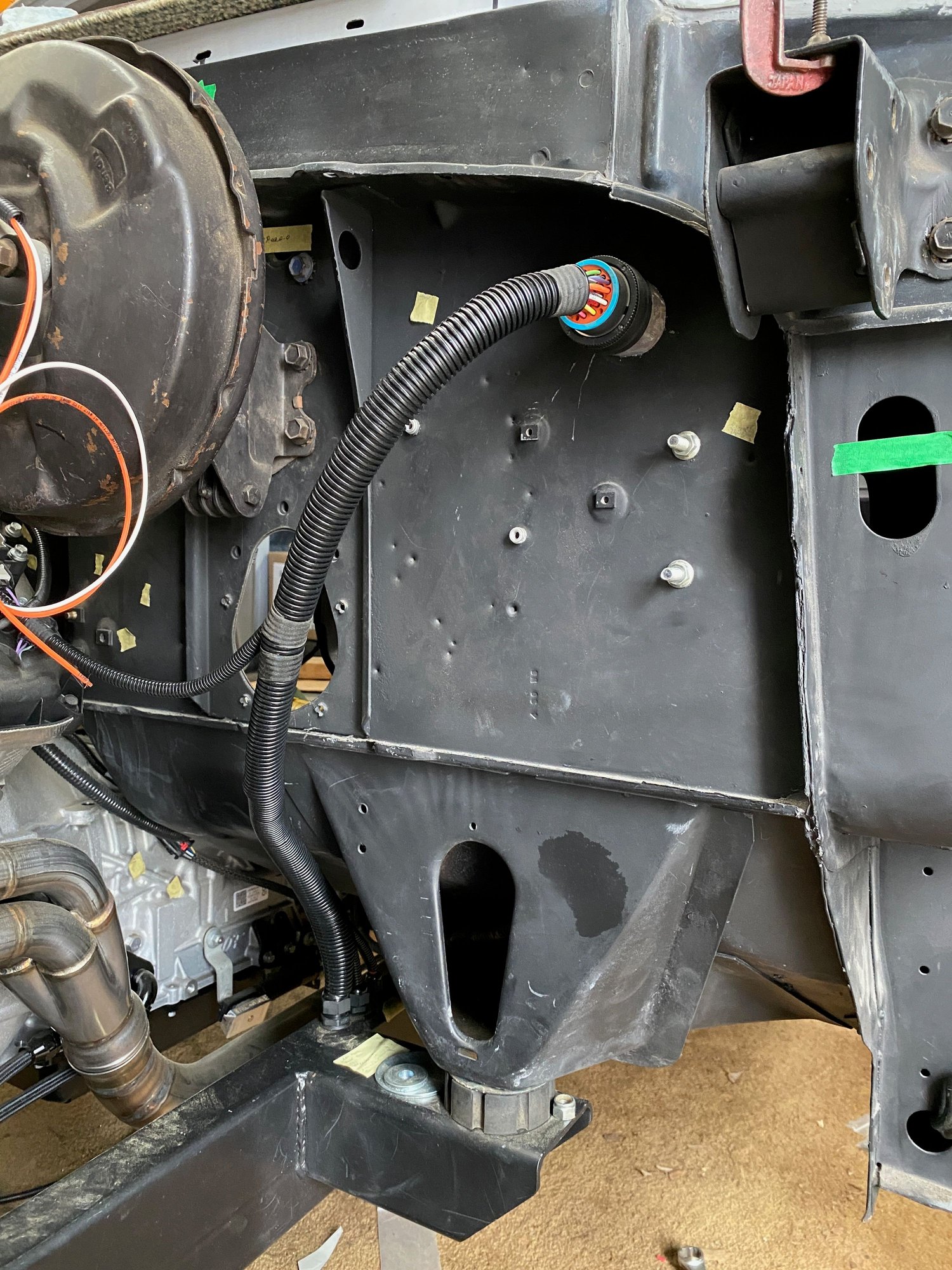 Bulkhead connector to firewall position. Still need to final wrap the loom once finalized.