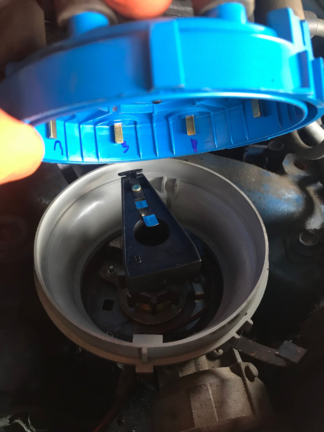 Distributor rotor pointing one plug contact off Ford Truck
