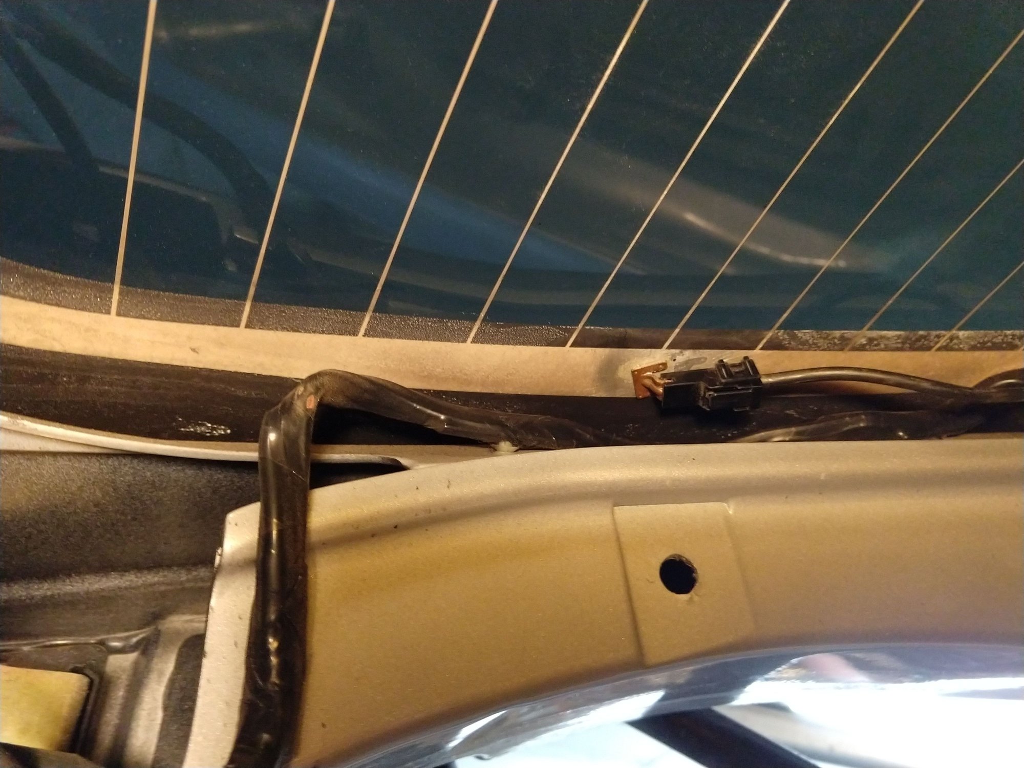 How to remove Excursion rear hatch trim and replace rear defroster tab