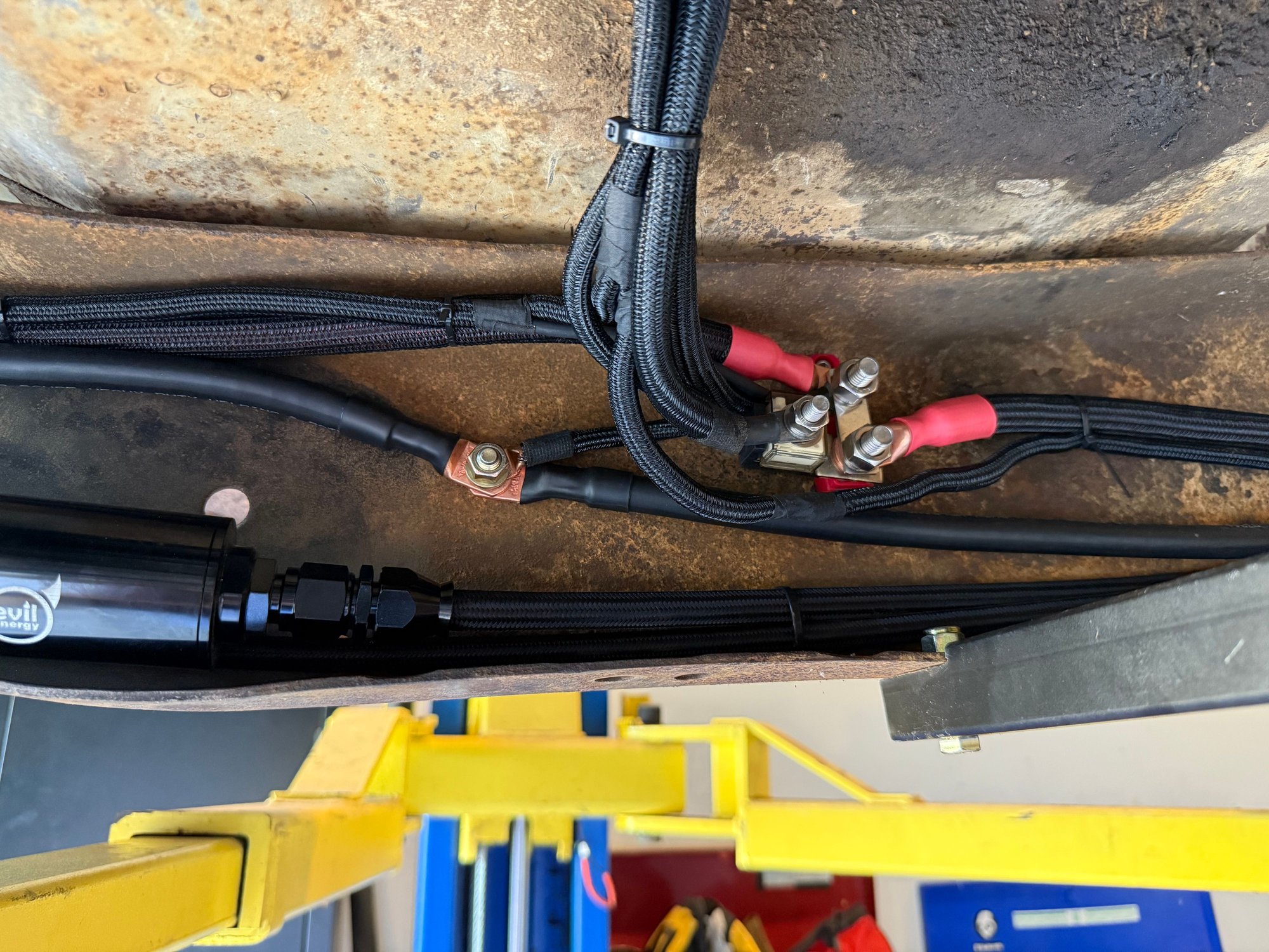 You can see where my negative cable is bonded with the frame before continuing on to the engine block. 