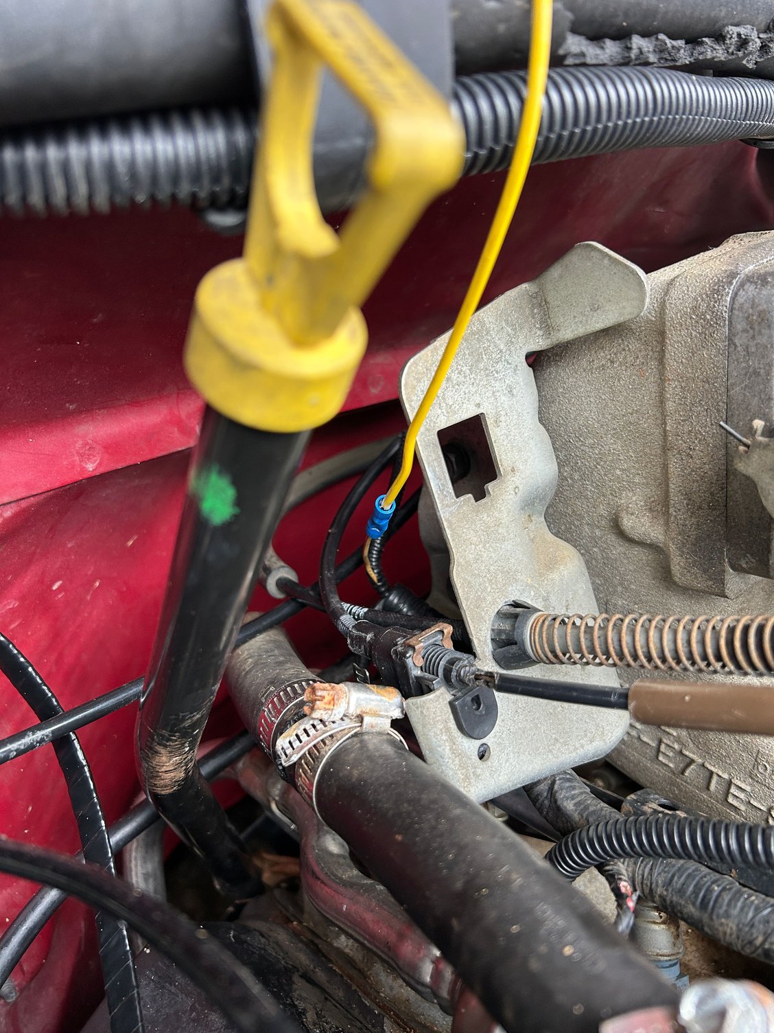 Firstly: What does this wire go to? The factory wire is yellow with a red stripe. It disappears into the harness behind the engine, and I don't want to tear into a harness to trace it.