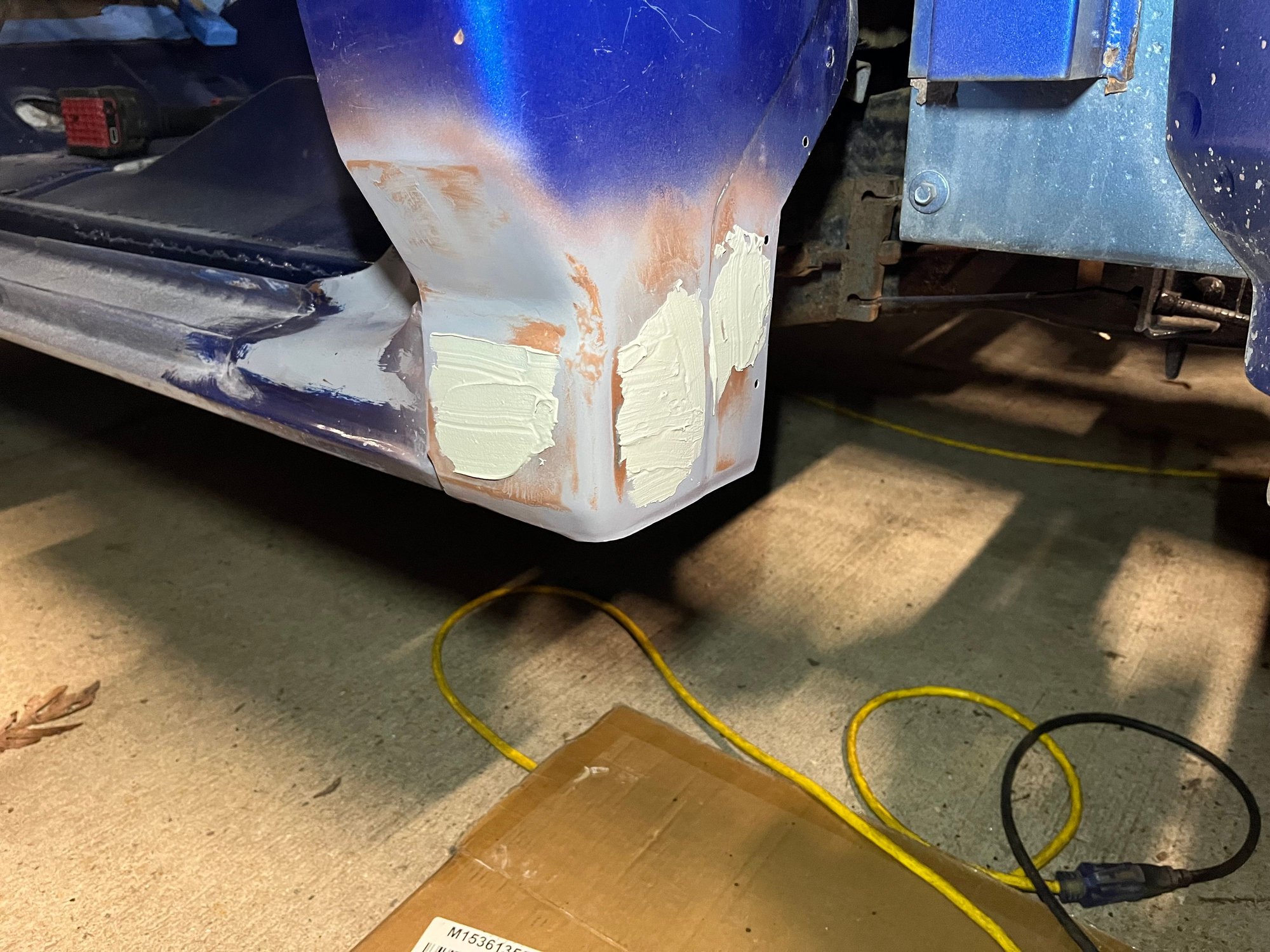 Second coat of Bondo, and this time you'll notice it's not as 