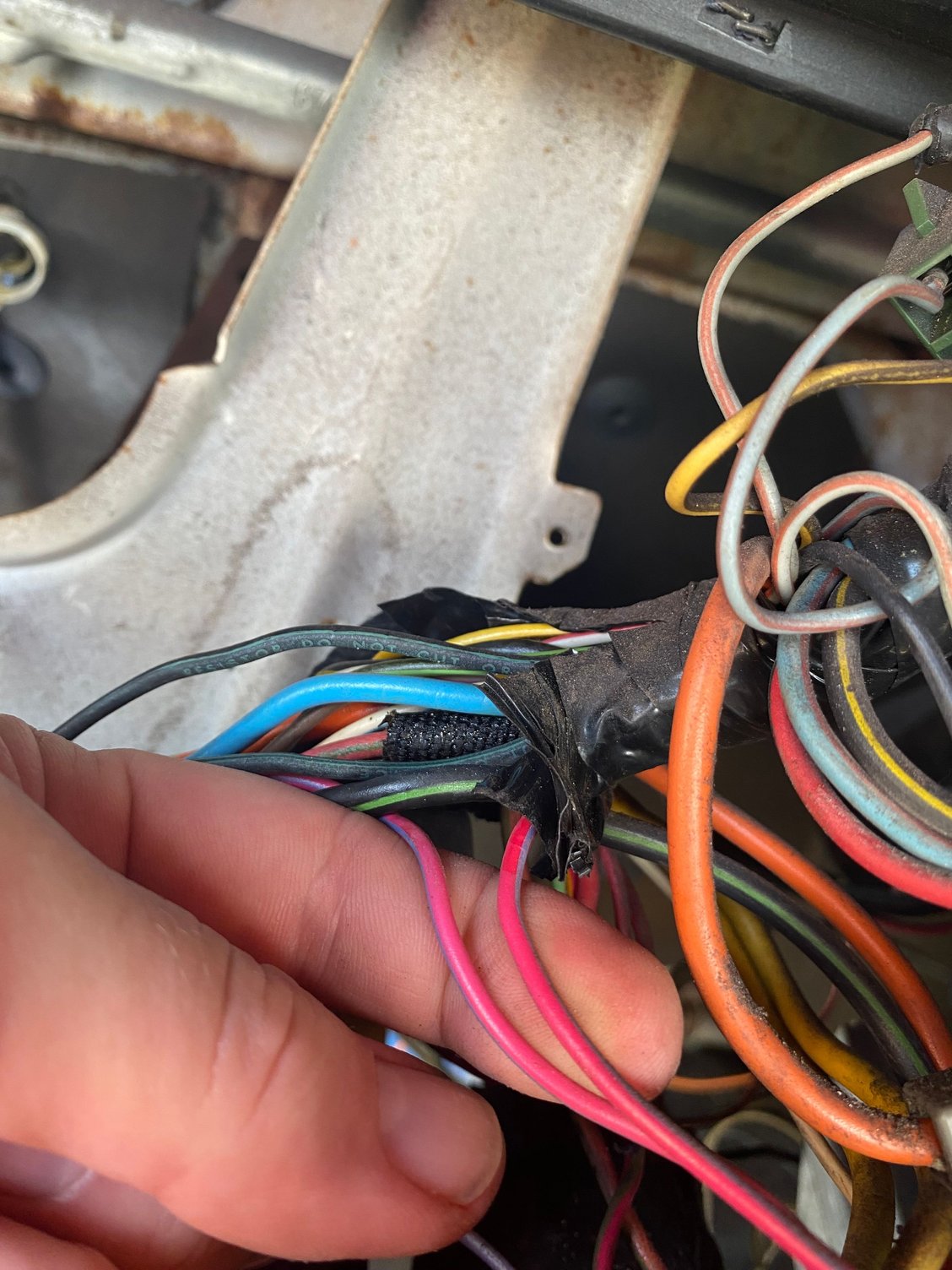 Two wires coming from point B(ignition key). One goes to the driver side firewall and the other goes to the passenger side/glove box area.