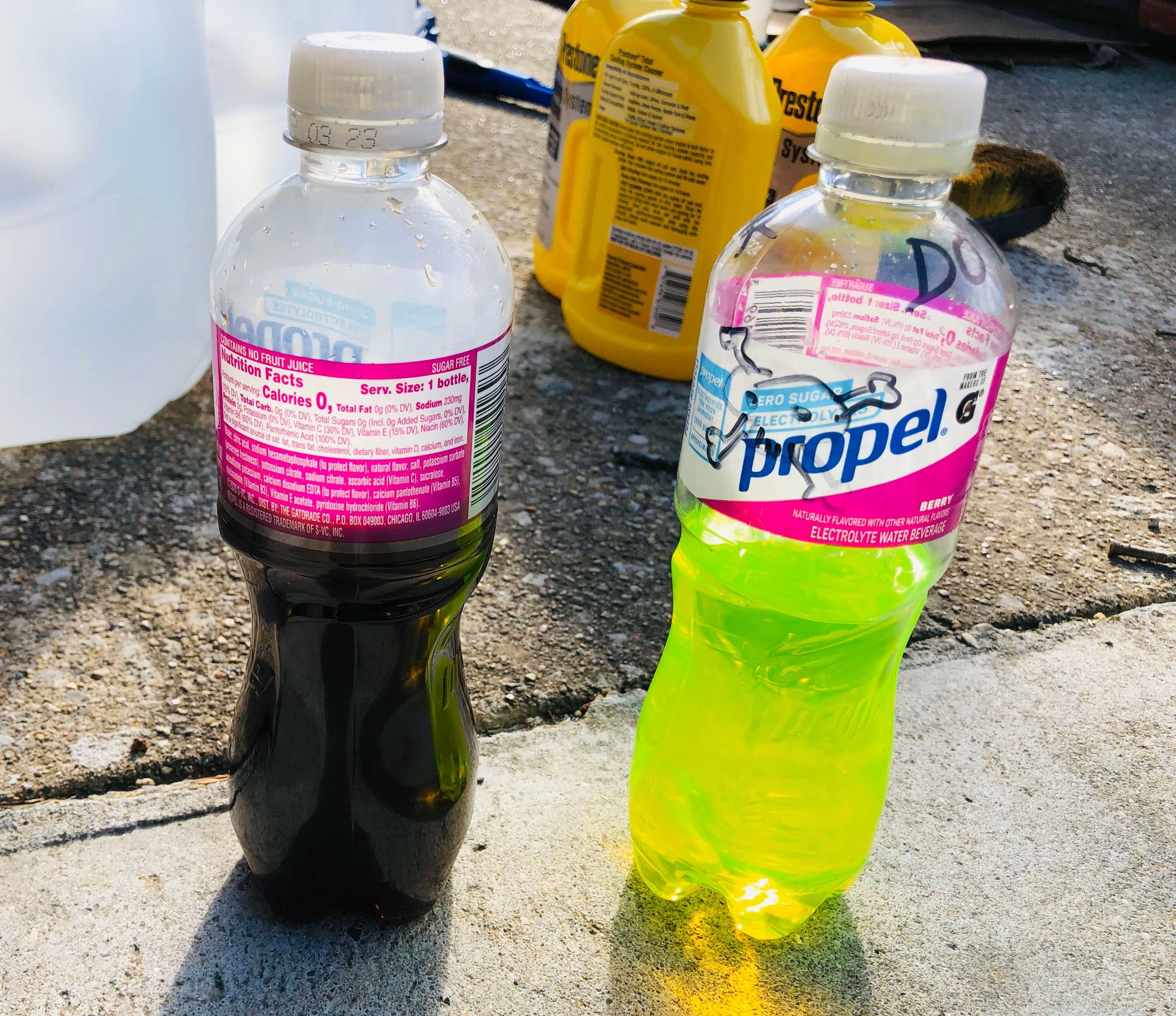 Left bottle is what drained out of radiator. Right bottle is the new coolant.