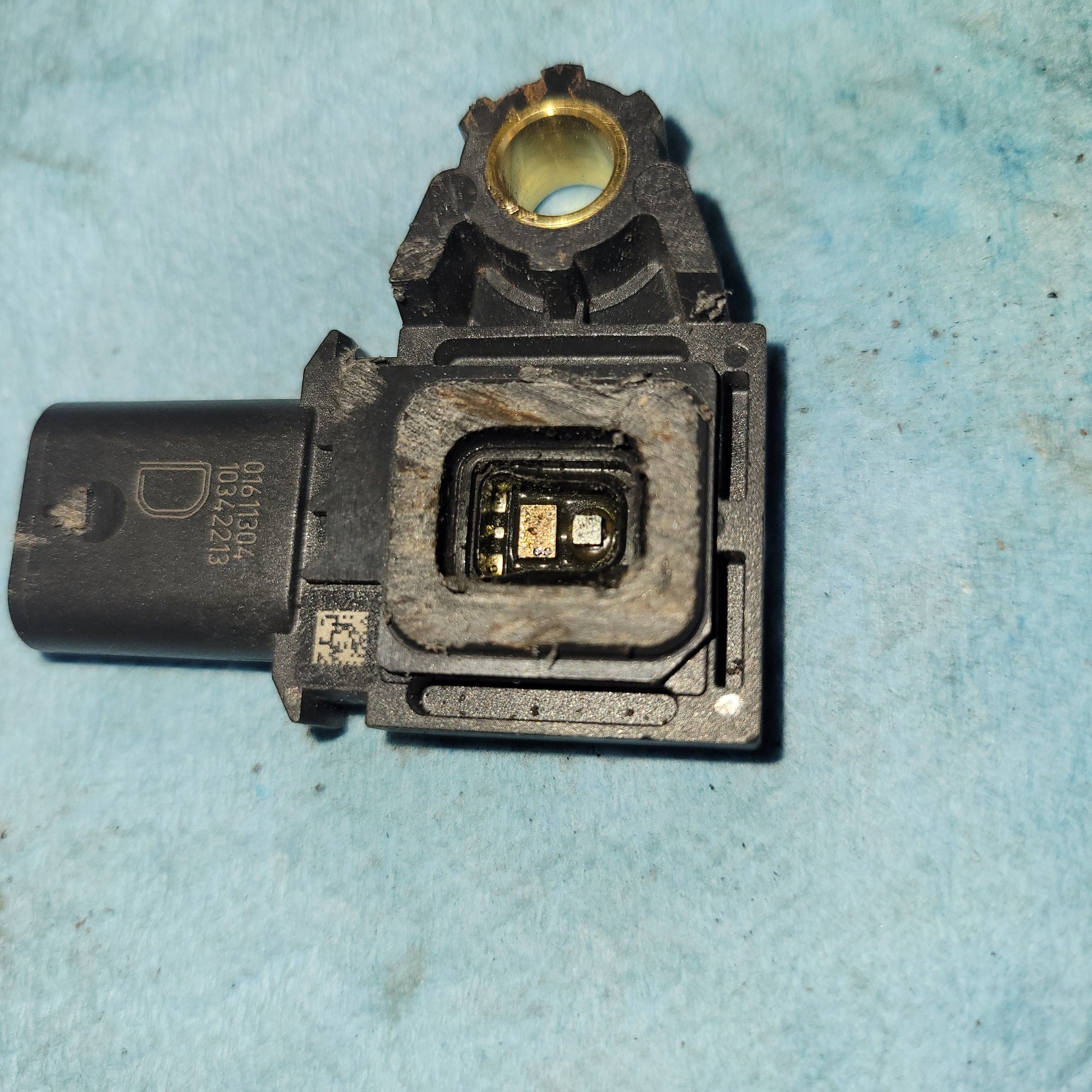 Old sensor during autopsy.