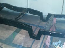 Frame blasted and painted. Sacrificial tubing removed and crossmembers reinstalled