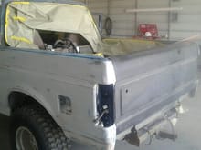 Ding by gas door opening fixed, new tailgate installed. More sanding....