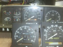 89 to 91 cluster with a 95 E350 PSOM speedometer installed.  F-series PSOM speedo is front right and 89 speedo is front center