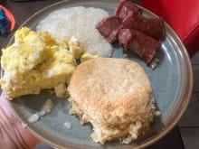 Kids helped too. So that is always nice. They made the eggs , deer sausage, and grits. 