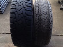 siped 37x13.50x20 Toyo RT next to factory spare