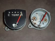 two temp gauges front view - both show about 10 ohms with a meter. I pulled the face off the right one to put on the meter guts from the 89 astro van.