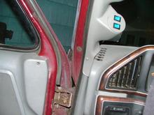 Another view of how the glowshift pod was trimmed to fit around the dash.  I left the bottom long to cover the pre-existing seam in the plastic trim.  If you look closely, the paint is scuffed at the very bottom where it sticks out enough to rub on the door trim.