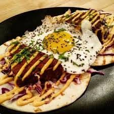 It's Tuesday and they are here for your enjoyment. Scrapple tacos! Here is one fine example, scrapple with red cabbage, egg and mustard. Yeah man, Get'em while they're hot.