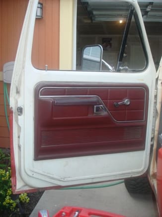 Original Red interior door panel.