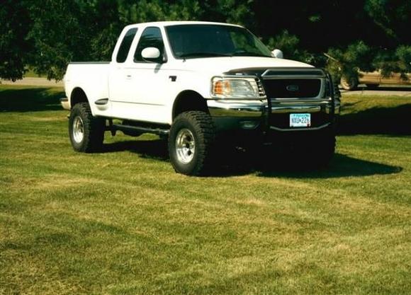 Procomp X terrains 315-75r-16's, 6in fabtech lift, truxedo tonneau cover, AFE air intake, custom dual exhaust(NO MUFFLERS and BIG tips), Edge Evolution programmer. Smitty built brush guard and taillight gaurds. More pics to come of the custom exterior work!!!