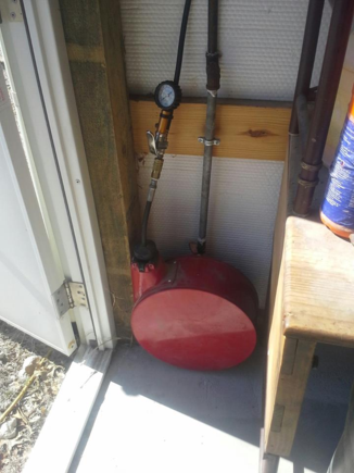 Iput this retractable hose reel by the door. I will probably keep that tire inflating tool on it most of the time. However, I may run a sandblaster with it too since it is close to outside.