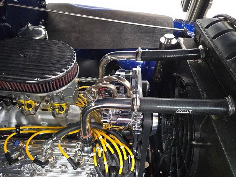 The 180� adapters.  Lines go under the compressor and beside the distributor.