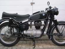 BMW R 26 
of 1956? 250 cc, shaft drive. (This is not my actual bike)
Great vibrations come with a single cylinder engine.