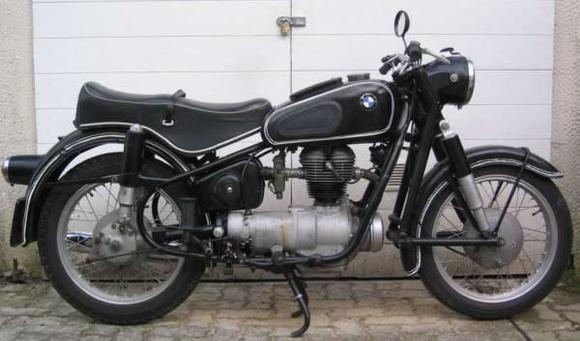 BMW R 26 
of 1956? 250 cc, shaft drive. (This is not my actual bike)
Great vibrations come with a single cylinder engine.