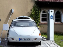 What AI thinks modern Tatra would look like charging at home.