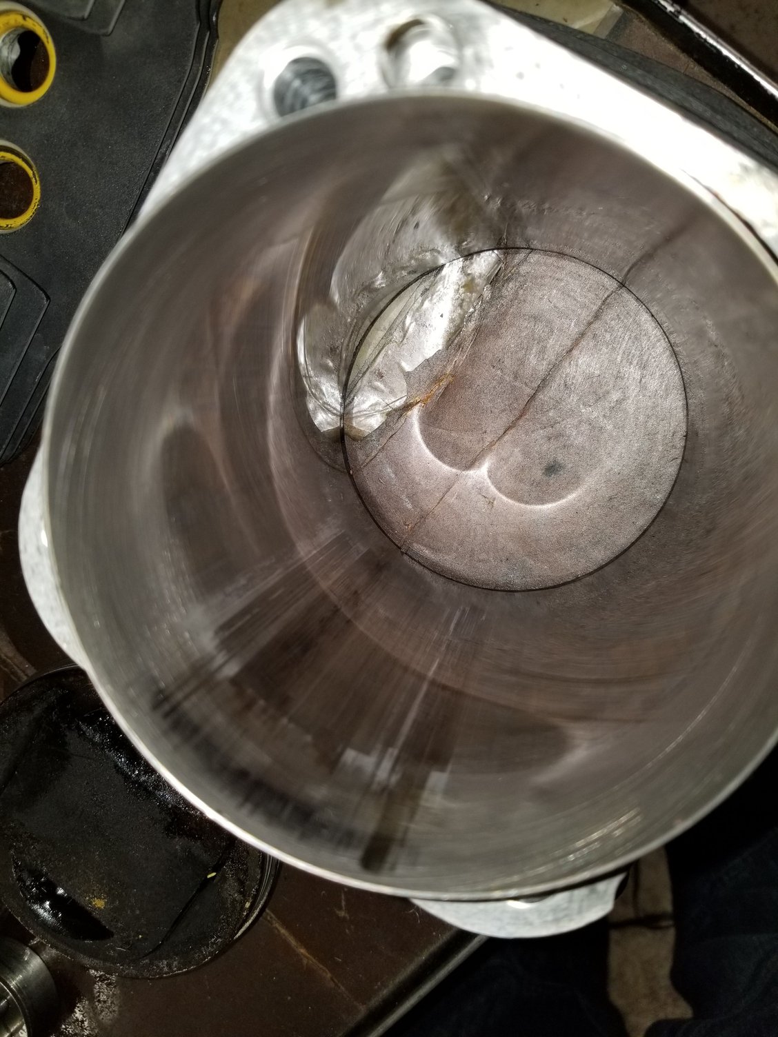 Loud knock and severe piston galling after 500 miles on rebuilt motor