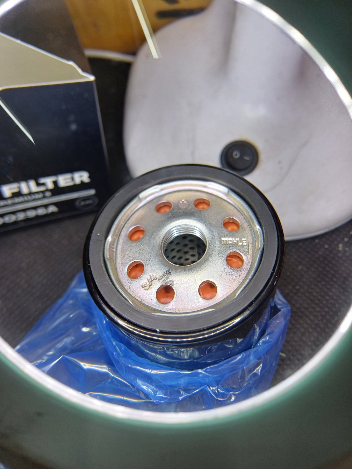 Filter now with holes rather than bent flutes & stamped Mahle.