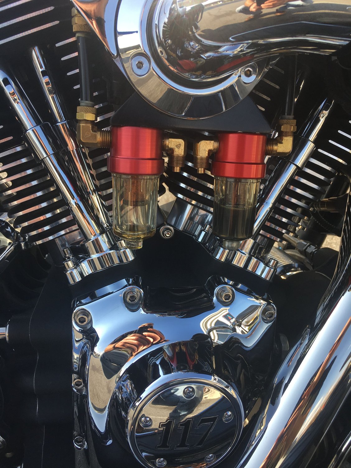 oil blowing out of head breathers and Harley oil cooler filter adapter Page 2 Harley