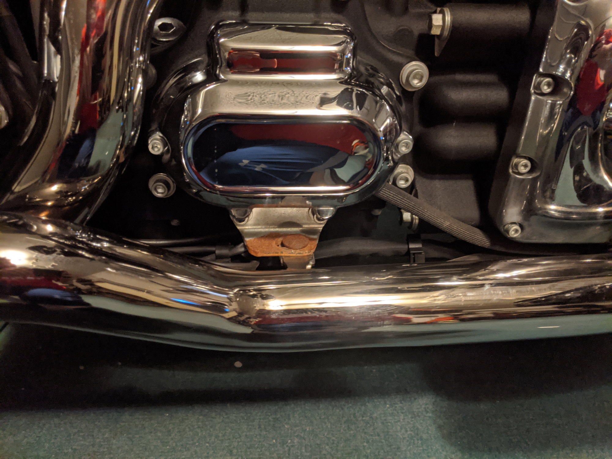 Help! Exhaust mounting bracket Harley Davidson Forums