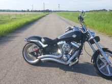 I've lowered the ass end 2 inches since this pic which closed up the huge gap between the fender and rear tire.
