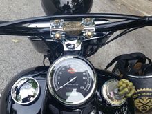 The brass emblem easily bent to conform to the shape of the fork clamp