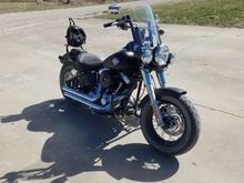 cut windshield to fit with 10 inch bars and not have to relocate turn signals. buffeting made it feel like my helmet was in a paintshaker