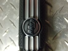 Some black rubbed off the mesh looking area from my throttle hand.