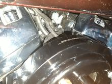 Top breather pipe tucked under wiring