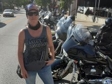 My wife standing in front of a row of bikes on Dickson . Quite a few bikes already here.