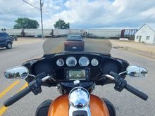 On a 2 lane road, somewhere in Iowa, waiting on a train. 