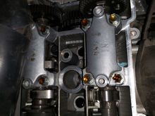 Removing cams to add smaller shims, they all have gotten tight