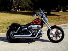 2010 Wide Glide with 103 cu in, Phase II upgrade; polished heads; wilder cam; ThunderMax closed loop tuner; Cobra intake; Python exhaust; RC Components wheels; 200 rear tire; Mustang 2-piece seat; 1.5" diameter bars and risers; Bars 10" high; Risers another 1.5" high; lots of chrome; etc; etc.
