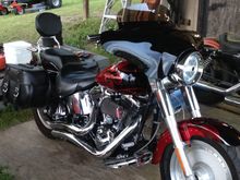 2006 FLSTFI FatBoy with 95 inch Stage III, purchased Feb 2014, 10,000 miles. Added bags, fairing, sissy bar. Thunderheader coming.