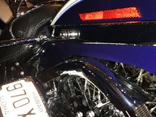 So my prblem, at least what I was told by the guy that did the framework.  Was that the fender hit the belt guard and won’t allow the bike to lay the frame flat on the ground.  According to him he had to adjust the shock to compensate.  