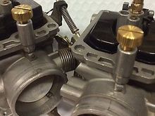 This carb is upside down and the header side. 